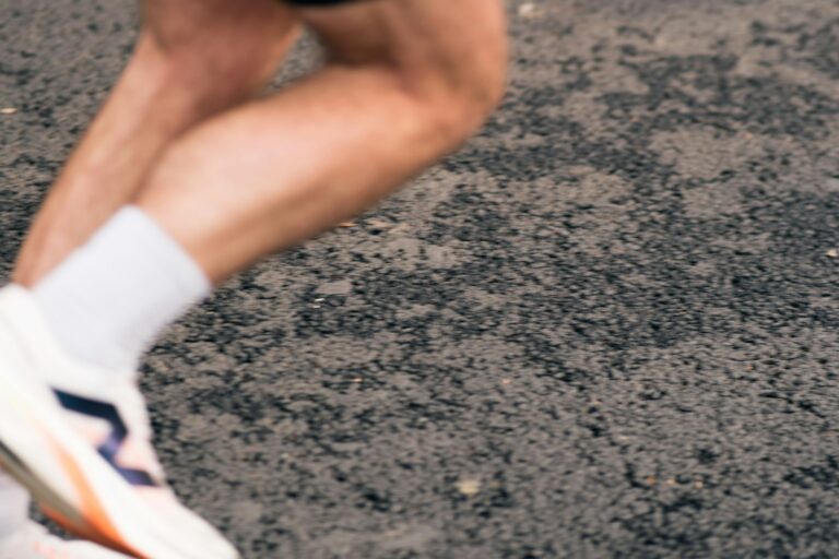 Close-up of a runner's legs in motion showing running form